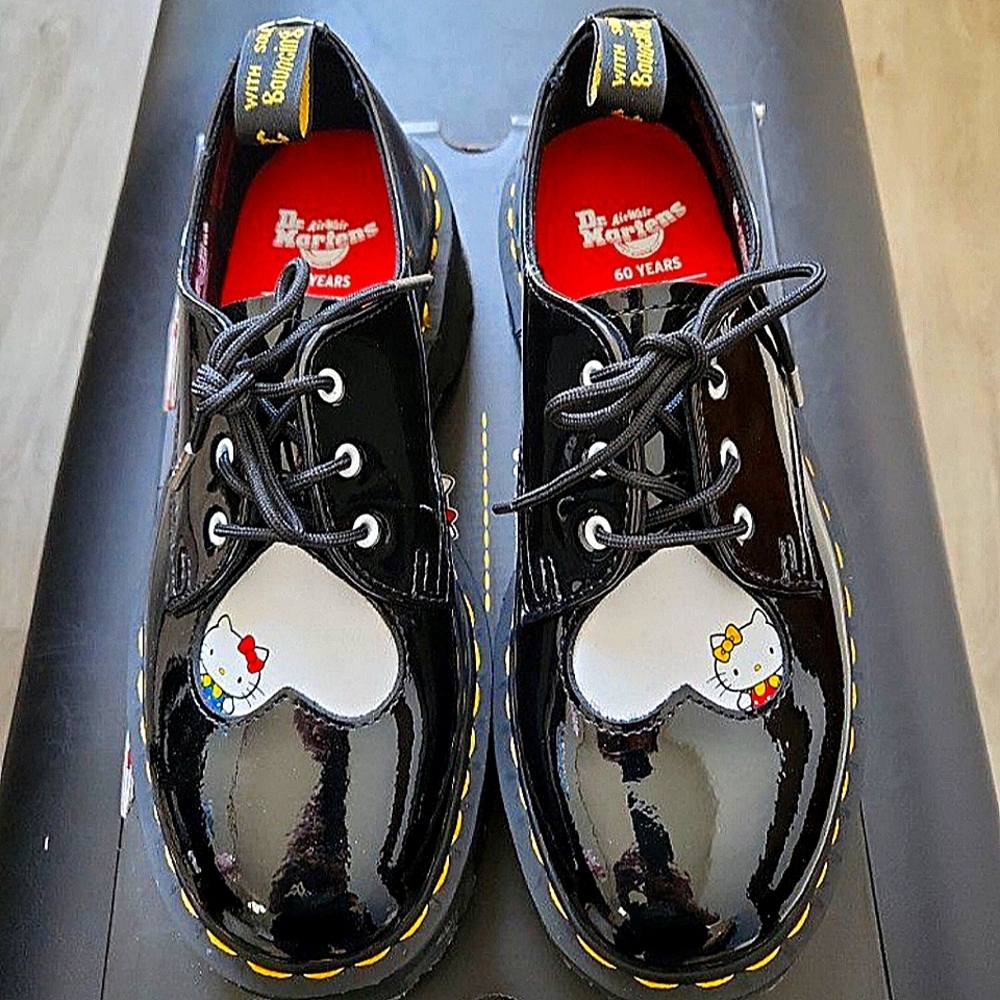 Dr. Martens women's size 8, black and white loafers